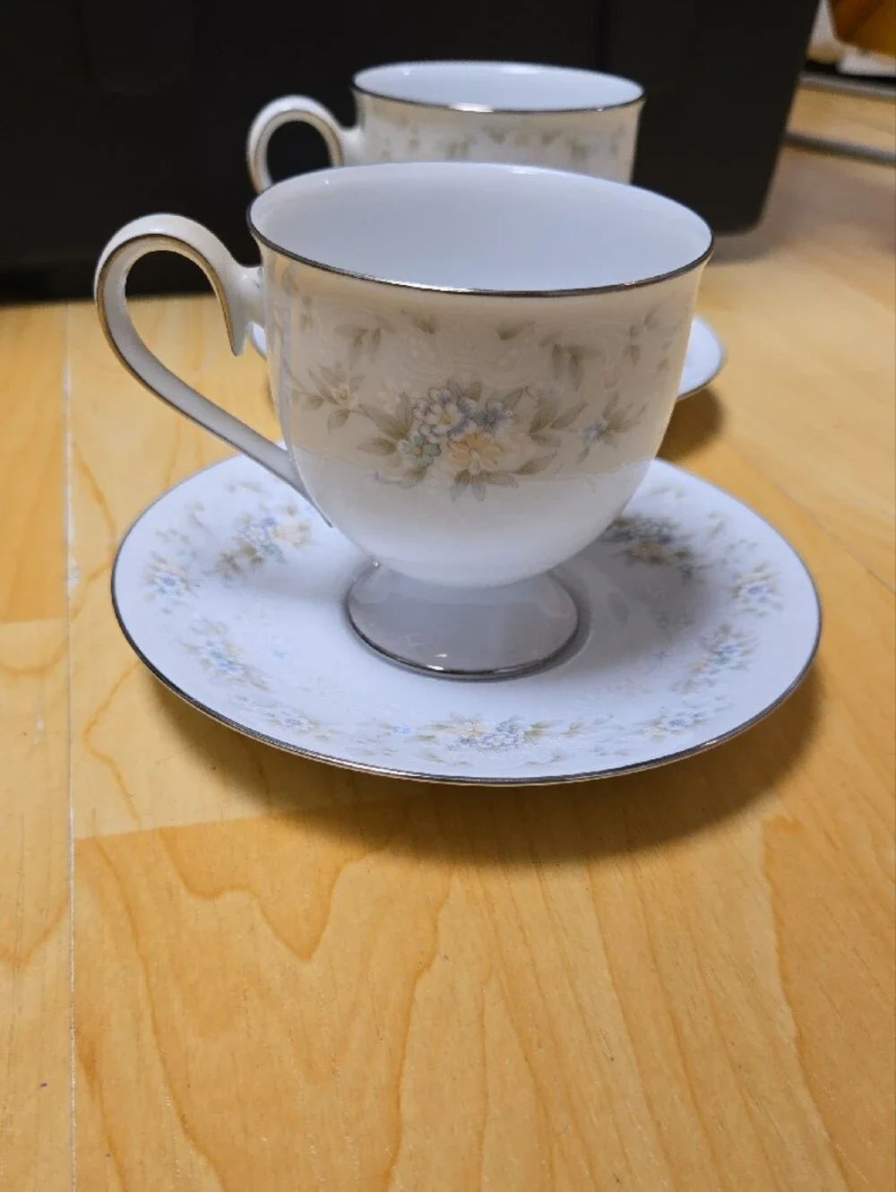 Elegant Noritake, White Floral Teacup and Saucer Set
